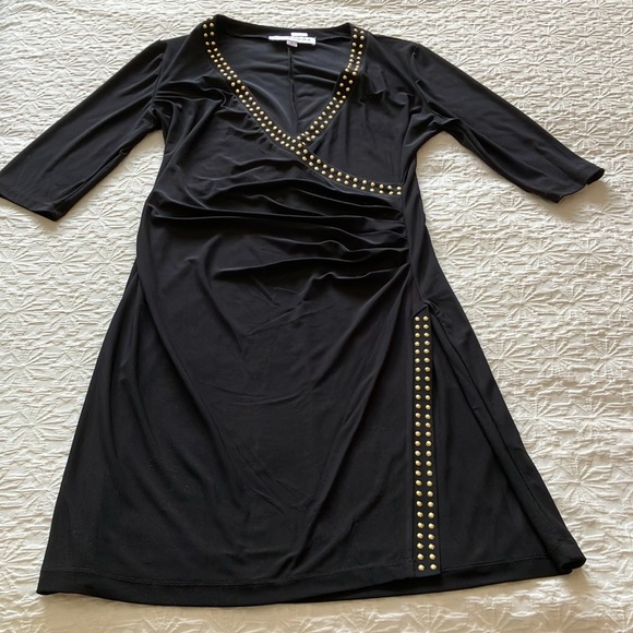 Elegant LBD w/crossover neckline & faux wrap skirt w/gold stud detail. - Picture 7 of 14